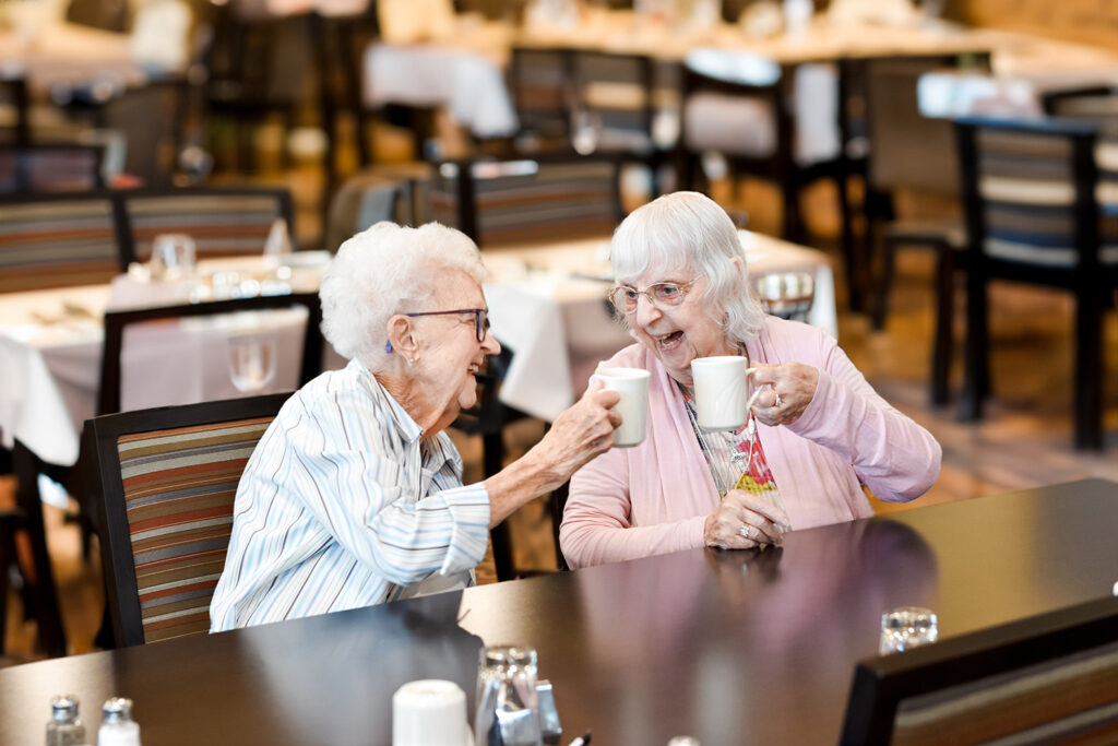 senior women enjoying coffee