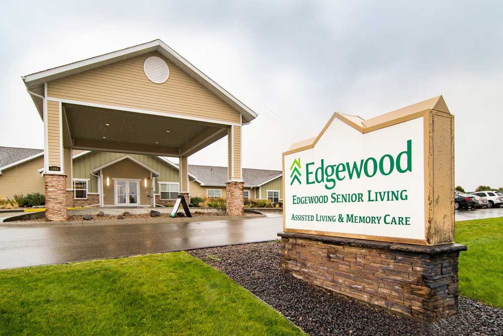 logo sign with Edgewood senior living assisted living and memory care