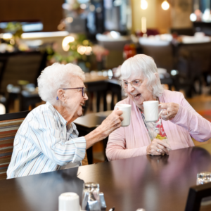 Female residents with coffee cups in hand